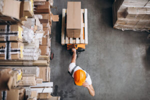 young man working warehouse with boxes 300x200 - Cube Nuroad Hybrid - E-Gravel Bike