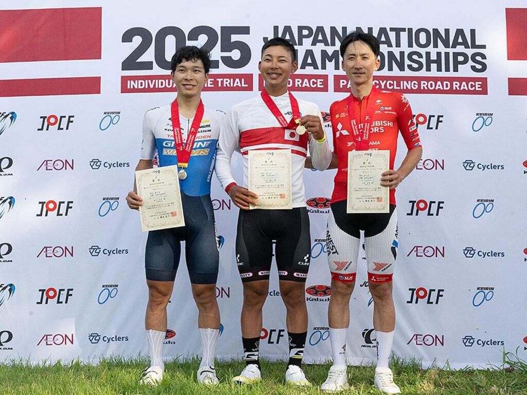 Shunsuke Imamura with gold medal and winner's certificate next to the second and third place winners at the Japanese Time Trial Championship 2025